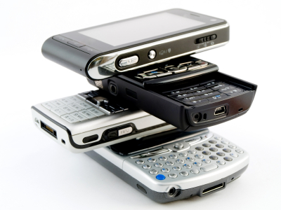 Stack Pile of Several Modern Mobile Phones PDA Cell Handheld Uni